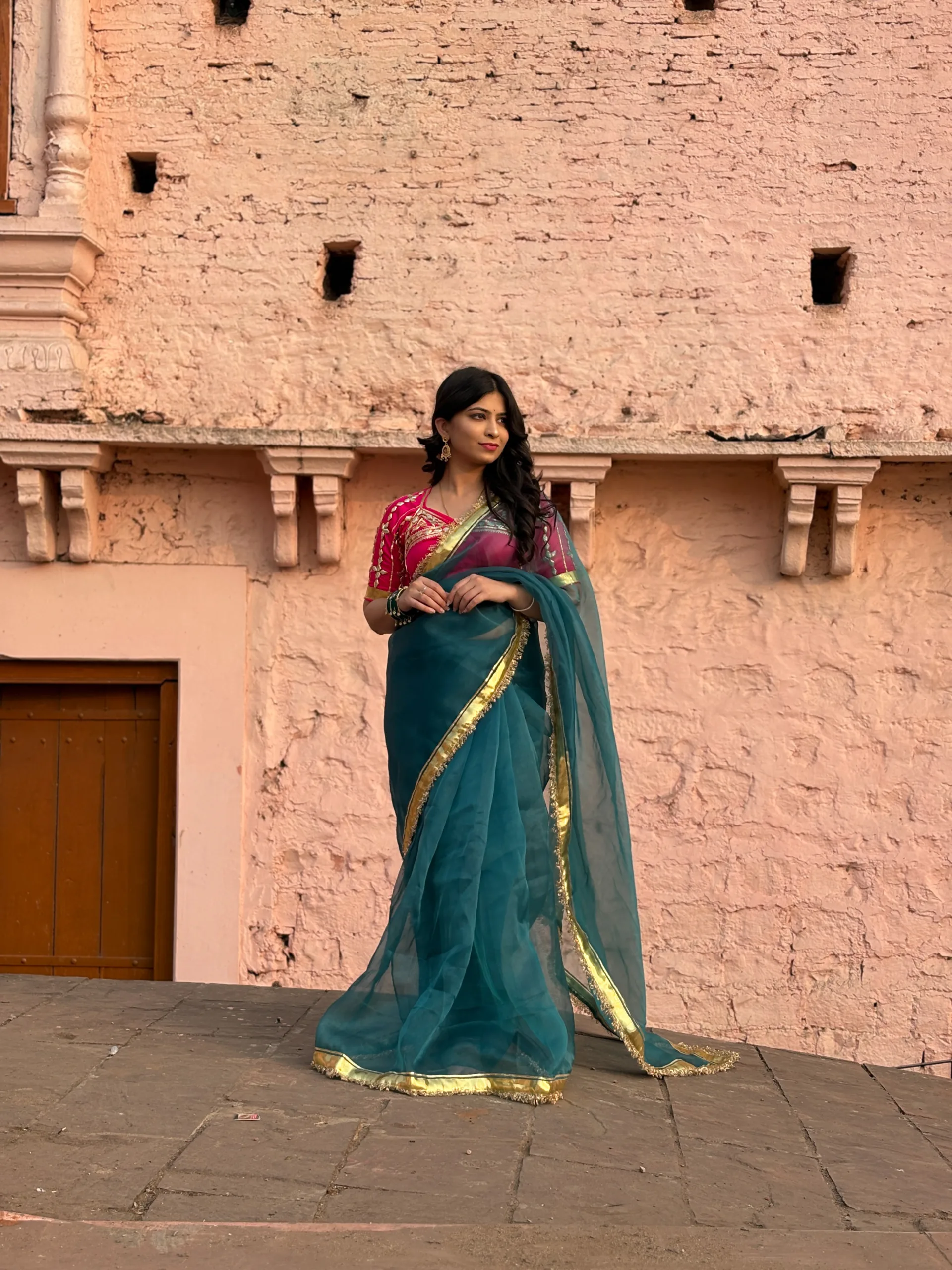 Siya Angi Saree – Teal Green Organza Saree with Gota Hand Work & Bright Pink Rajputi Blouse